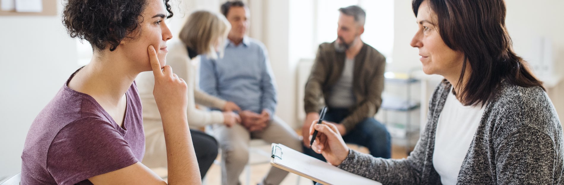 Group in therapy talks to each other