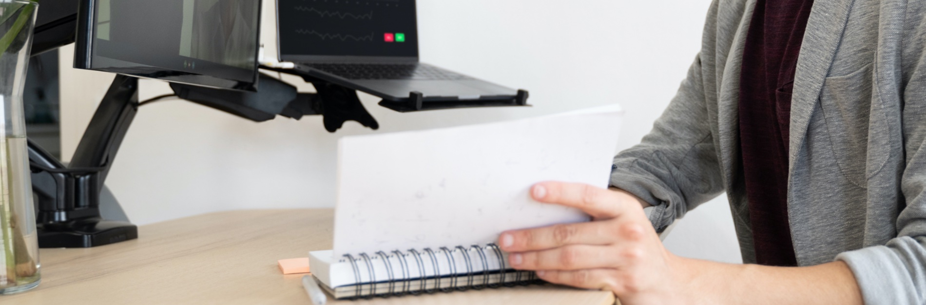 Man looking at notebook